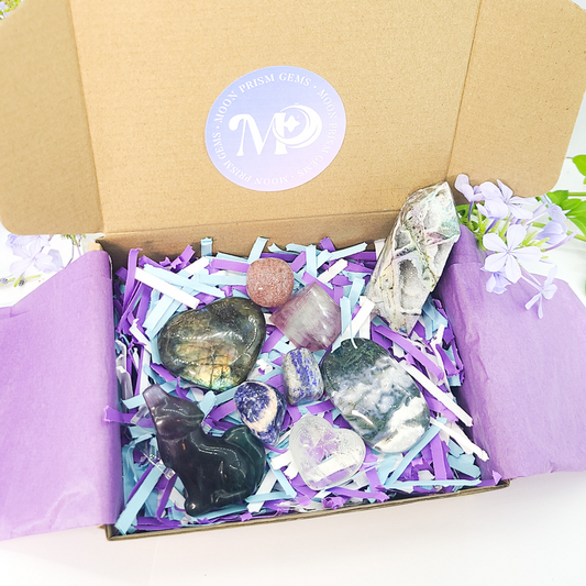 Box of crystals with a purple label on a white background